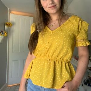Never worn yellow blouse with white stars